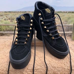 Unisex Vans SK8 Hi triple black platform.